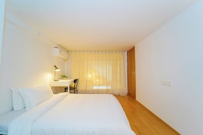 Executive Loft, 2 Bedrooms | Minibar, desk, blackout drapes, free WiFi