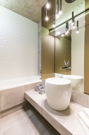 Apartment, 1 Bedroom, City View | Bathroom | Bathtub, deep soaking tub, free toiletries, hair dryer