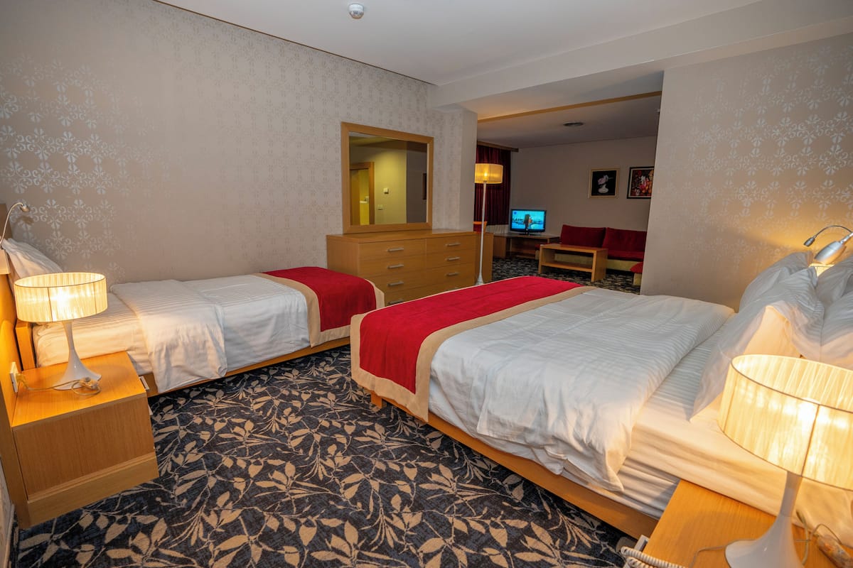 Family Room, Multiple Beds | 1 bedroom, minibar, in-room safe, soundproofing