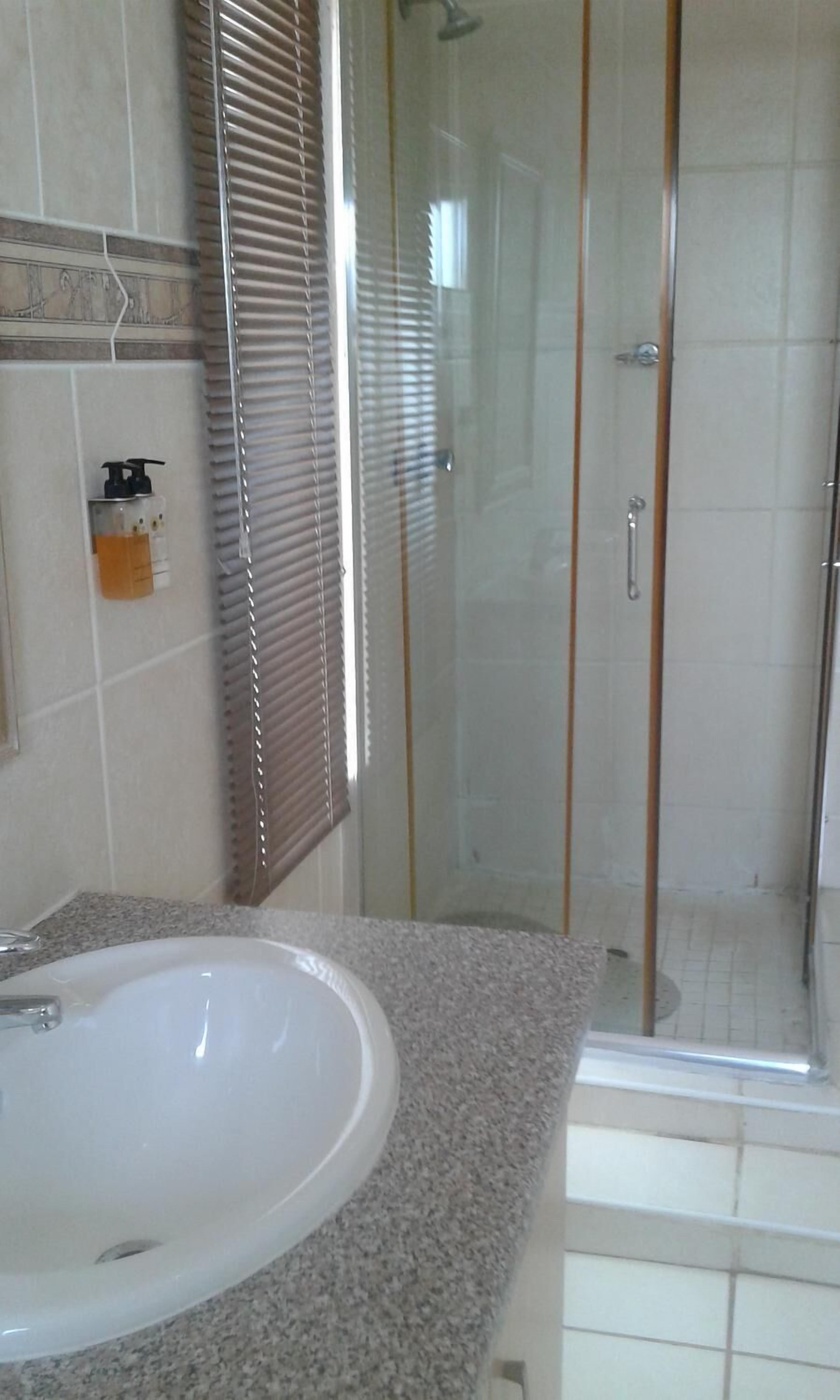 Separate tub and shower, deep soaking tub, free toiletries, towels