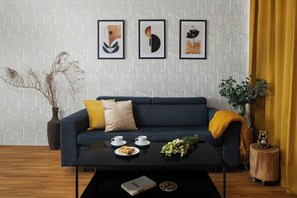 Premium Apartment, 1 Bedroom | Living area | Flat-screen TV