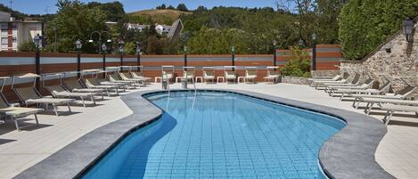Seasonal outdoor pool, pool loungers