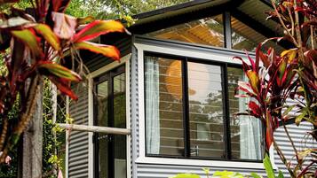 Romantic Cabin, 1 Bedroom, Bathtub, Garden View | Bathroom | Separate bathtub and shower, deep-soaking bathtub, free toiletries