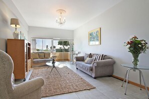 Apartment, 1 Bedroom, Ocean View | Living area | Flat-screen TV - Edward Court 1 Bedroom Sea Facing (Cape Town)