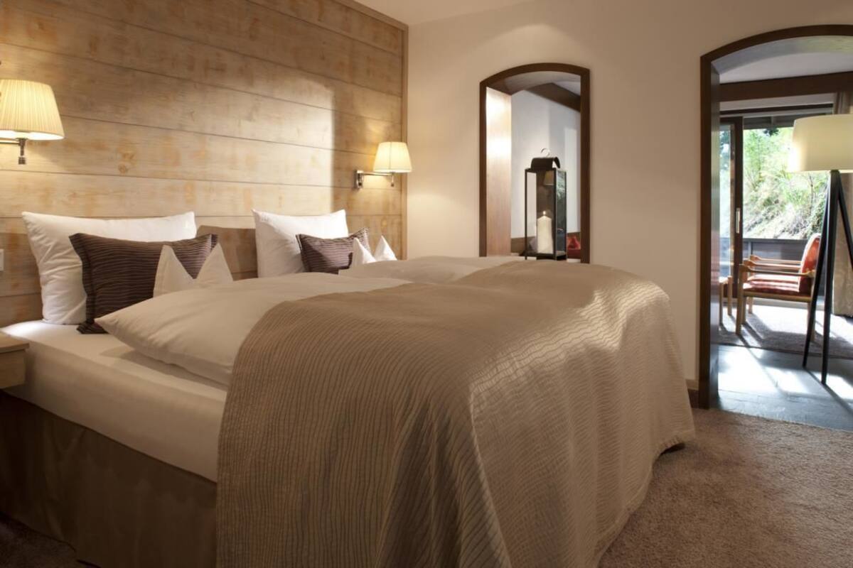 Hypo-allergenic bedding, down duvets, minibar, in-room safe