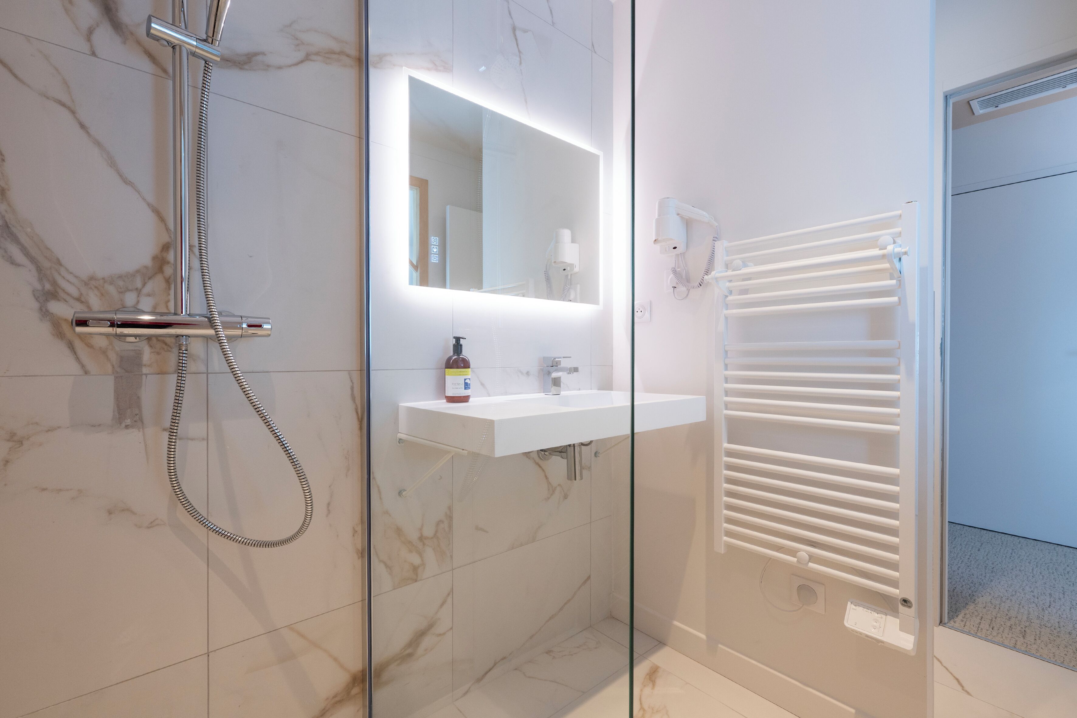 superior double room | bathroom | shower, rainfall showerhead, eco-friendly toiletries, hair dryer