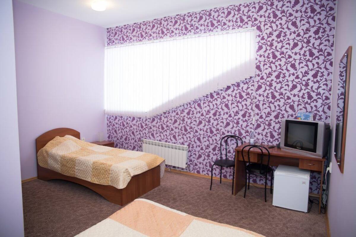 Standaard Twin kamer | 1 slaapkamer, luxe beddengoed, een bureau, een strijkplank/strijkijzer