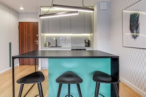 Deluxe Apartment, 1 Bedroom, Balcony (with parking -123) | Iron/ironing board, free WiFi, bed sheets
