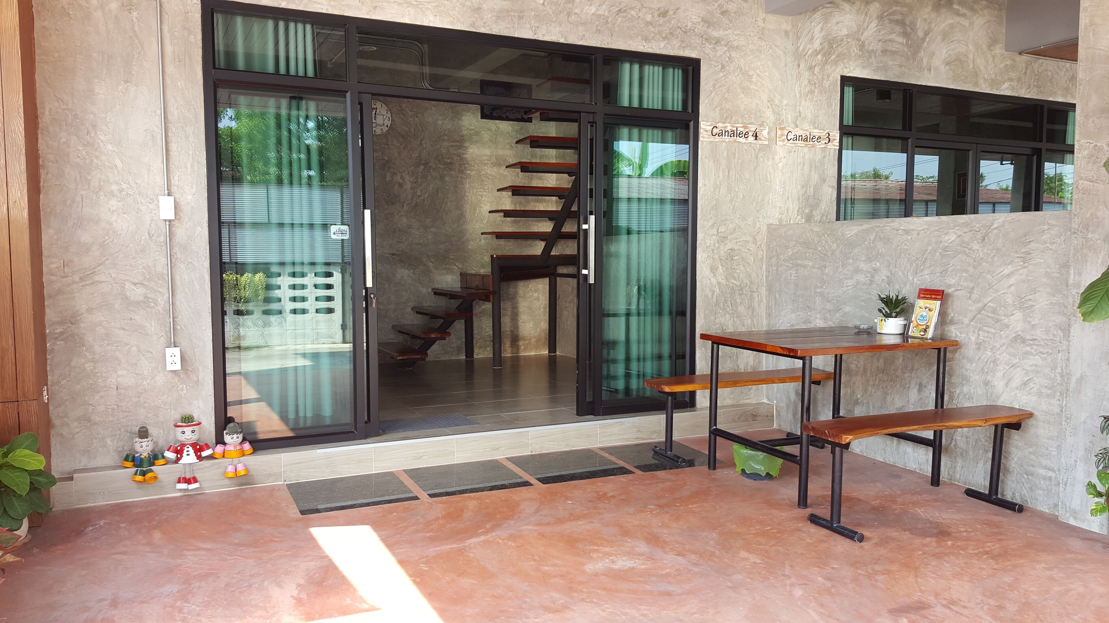 2-bedroom house | living area | flat-screen tv