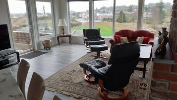 Luxury Apartment, 3 Bedrooms | Living room | Flat-screen TV