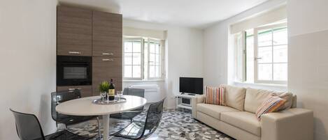 Basic Apartment, 2 Bedrooms | Living area | Flat-screen TV