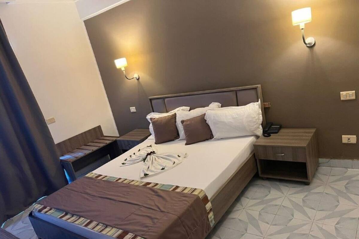 Standard Double or Twin Room, City View | Blackout drapes, iron/ironing board (on request), WiFi (free)