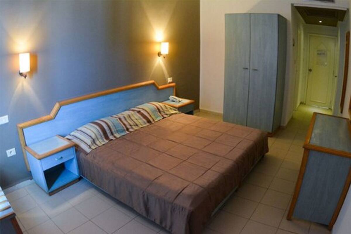 Standard Triple Room, City View | Blackout drapes, iron/ironing board (on request), WiFi (free)