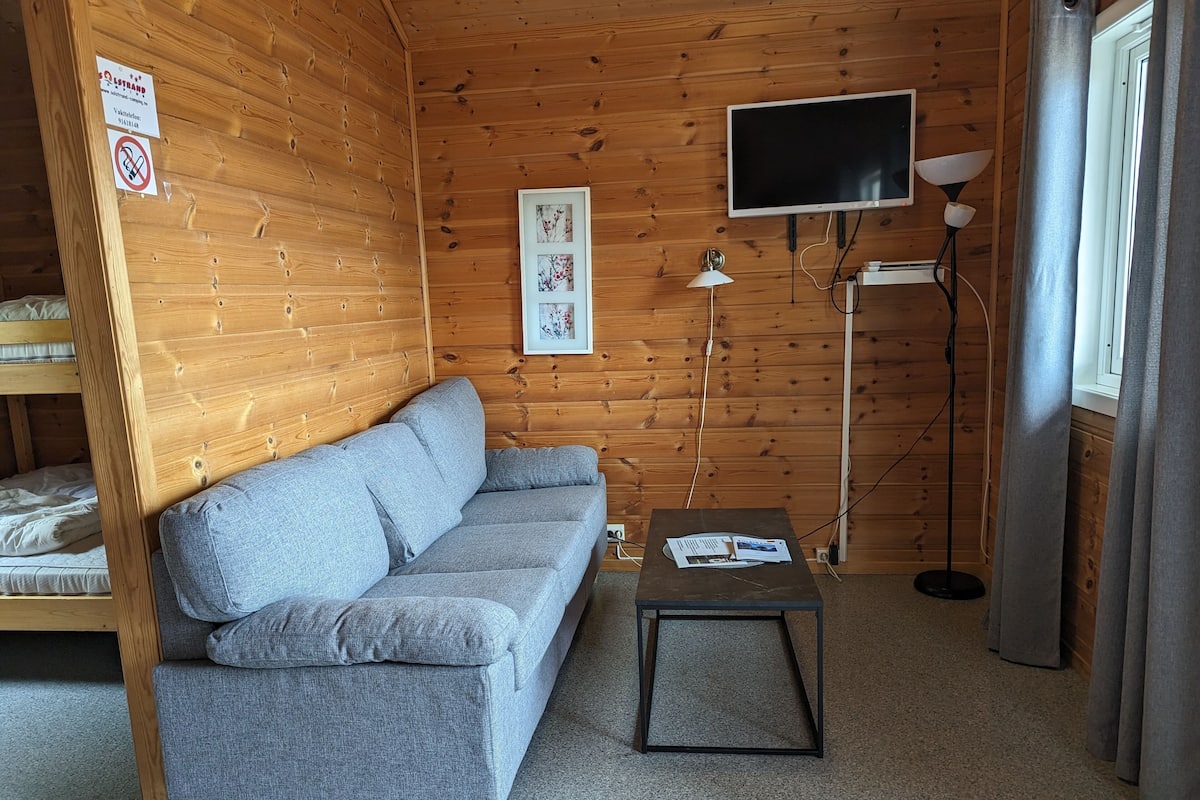 Baita (9 - 10 shared shower) | Area soggiorno
