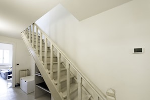 Basic Apartment, 3 Bedrooms | Living area | Flat-screen TV