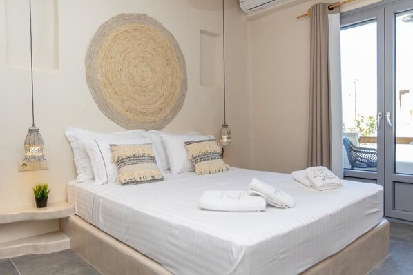 Habitación cuádruple Deluxe, 1 habitación | Wifi gratis y ropa de cama