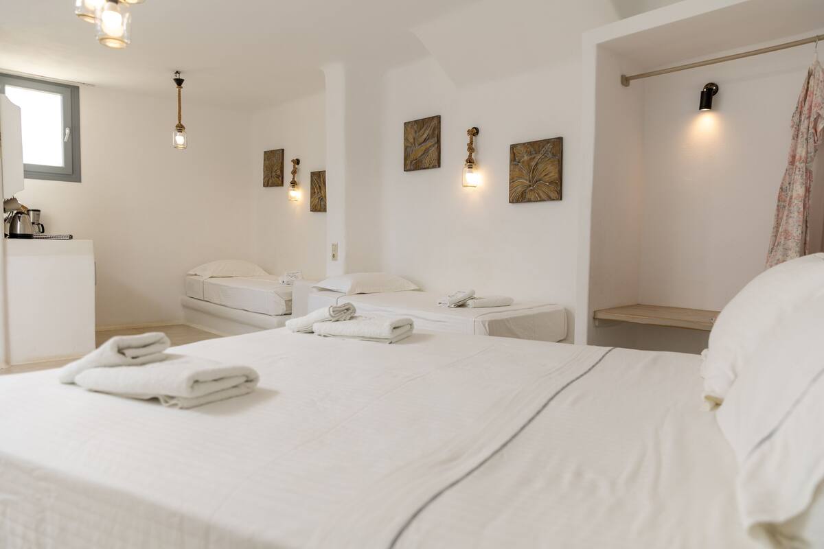 Economy Quadruple Room, Kitchenette, Ground Floor | Hypo-allergenic bedding available, blackout drapes, soundproofing
