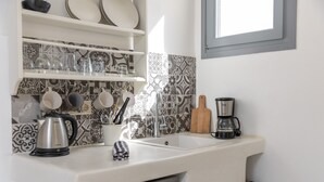 Habitación cuádruple económica, cocina básica, planta baja | Cocina privada