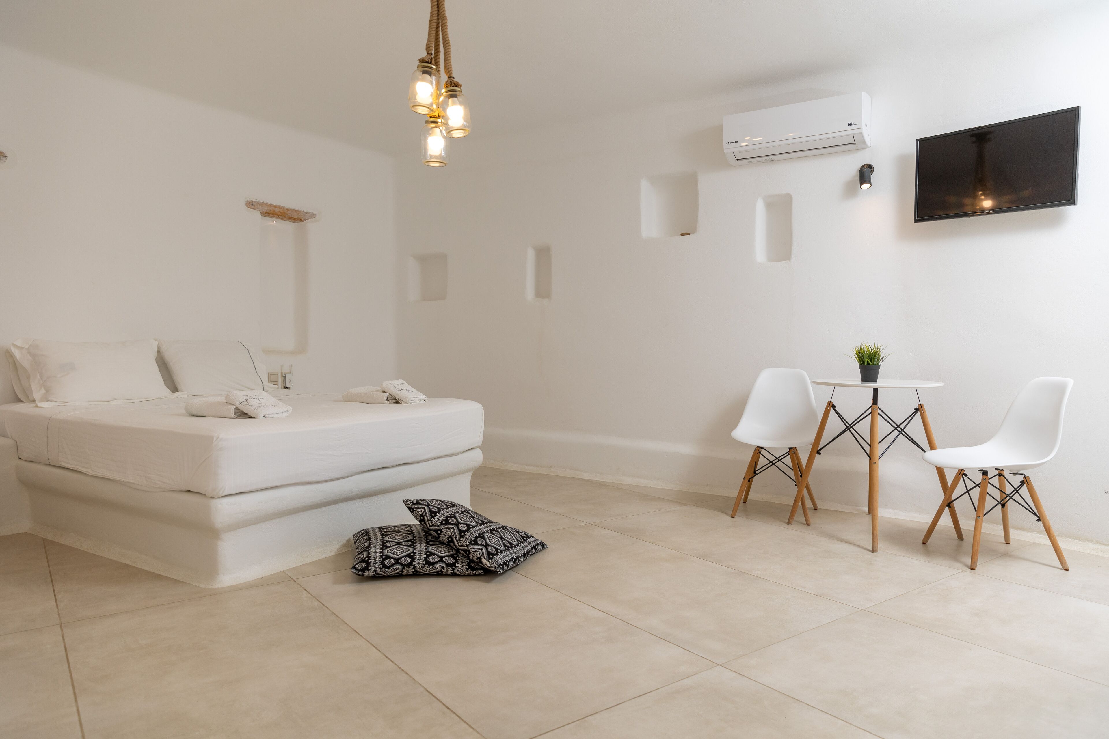 Economy Quadruple Room, Kitchenette, Ground Floor | Hypo-allergenic bedding, individually decorated, blackout drapes