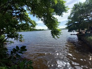 A river with trees on the banks and a clear sky. - Shenya Villa (Bentota)