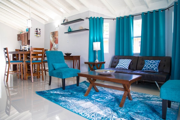 Elite Villa, 2 Bedrooms, Non Smoking, 2 Bathrooms | Living room | 50-inch flat-screen TV with cable channels, TV, DVD player