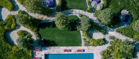 2 outdoor pools, open 8 AM to 8 PM, pool umbrellas, pool loungers