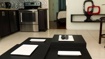 50-inch flat-screen TV with cable channels, TV, DVD player