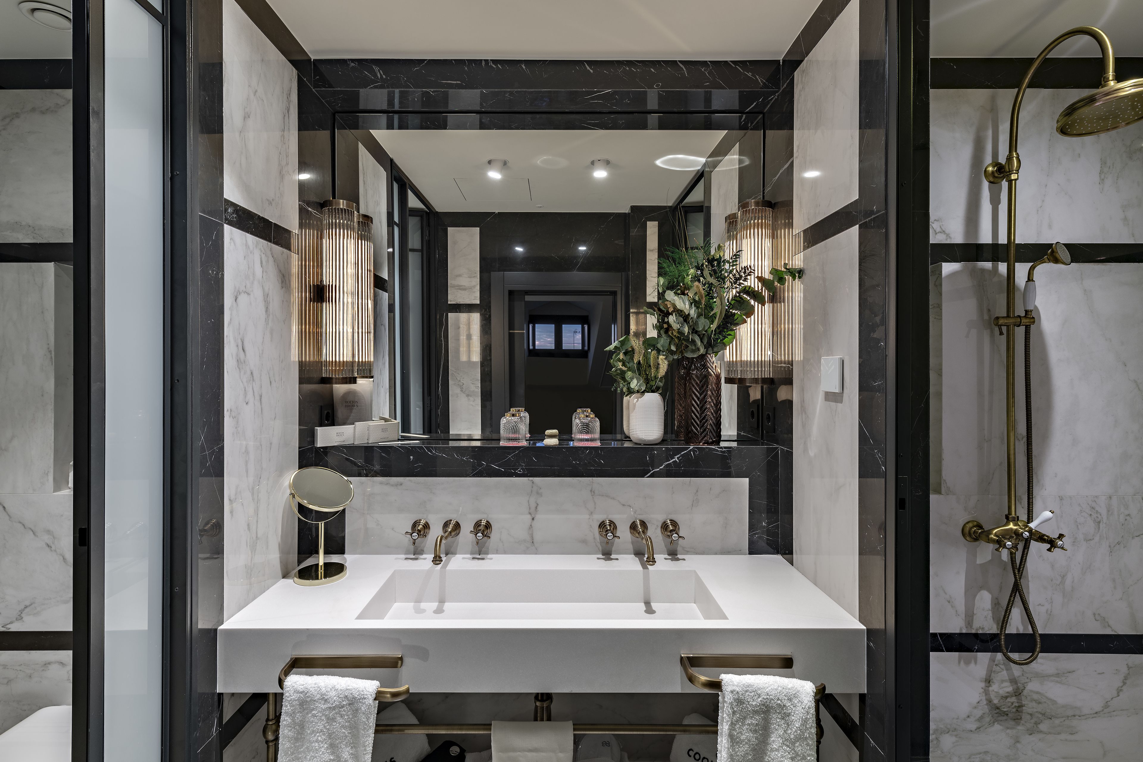 premium bedding, down duvets, memory-foam beds, minibar