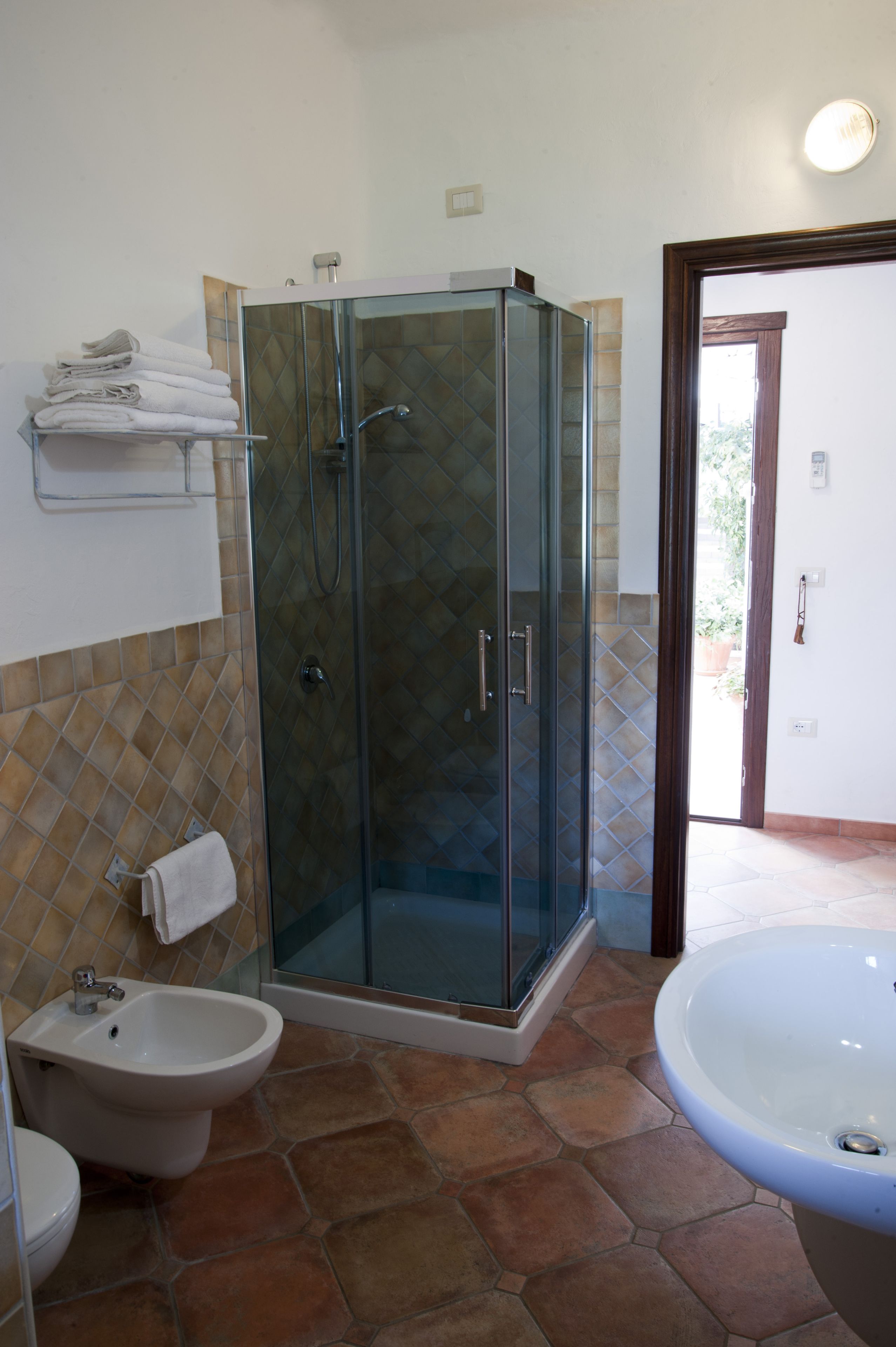 economy quadruple room | bathroom | shower, free toiletries, hair dryer, bathrobes