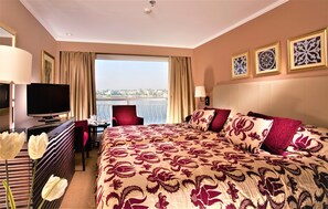 Luxe beddengoed, een minibar, een kluis op de kamer, beddengoed