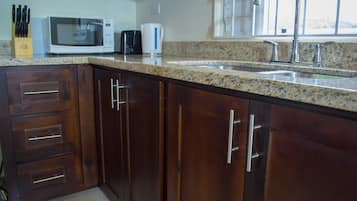 Family Villa, 2 Bedrooms, Non Smoking, Garden View | Private kitchen | Full-sized fridge, microwave, oven, stovetop