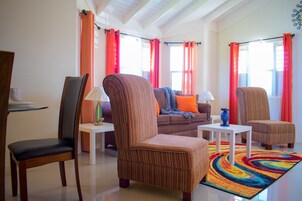 Family Villa, 2 Bedrooms, Non Smoking, Garden View | Living area | 50-inch flat-screen TV with cable channels, TV, DVD player