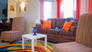 Family Villa, 2 Bedrooms, Non Smoking, Garden View | Living area | 50-inch flat-screen TV with cable channels, TV, DVD player