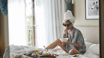 Lakens van Egyptisch katoen, luxe beddengoed, donsdekens, een minibar