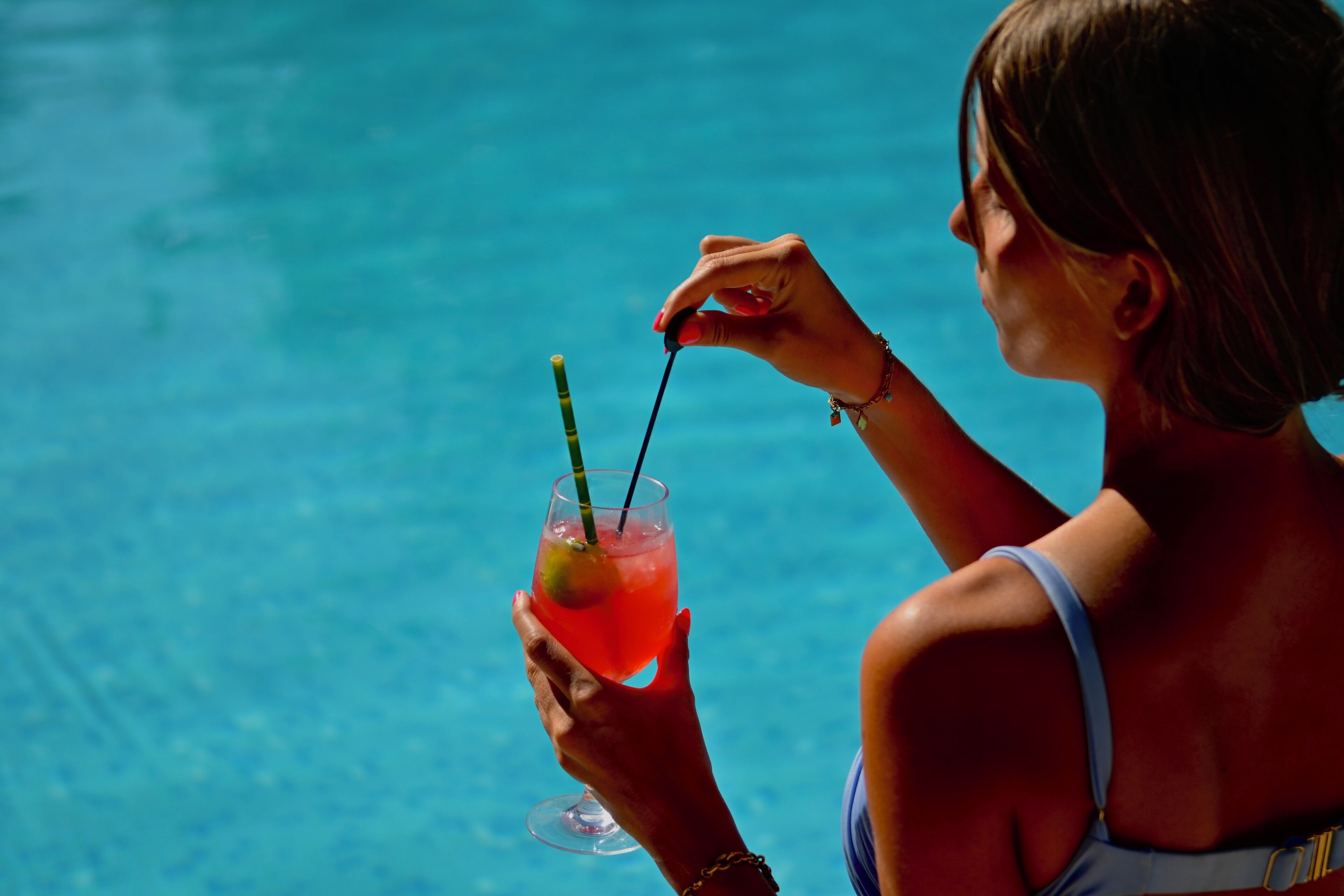 Seasonal outdoor pool, open 10 AM to 7:00 PM, pool umbrellas