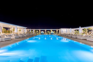 Seasonal outdoor pool, open 9 AM to 7:00 PM, free pool cabanas