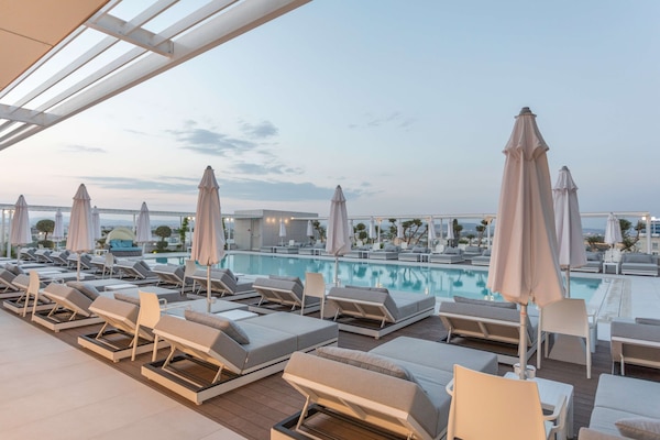 Seasonal outdoor pool, open 9 AM to 7:00 PM, free pool cabanas