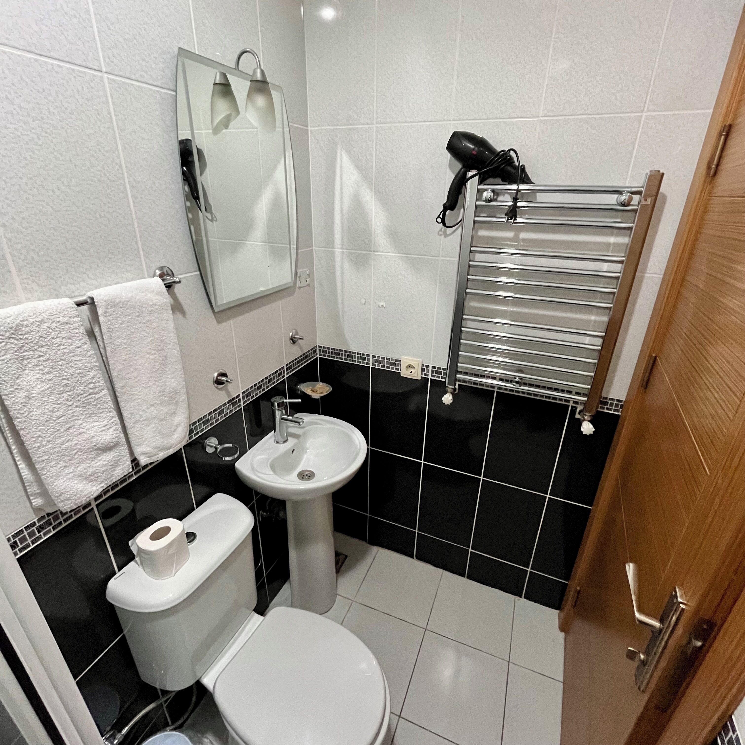 standard room | bathroom | shower, free toiletries, hair dryer, slippers