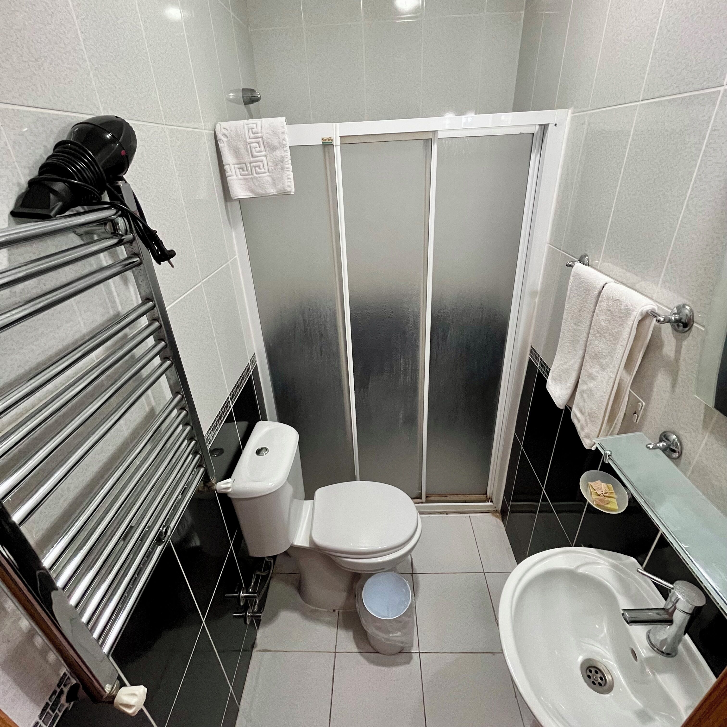 comfort triple room, balcony, sea view | bathroom | shower, free toiletries, hair dryer, slippers