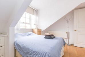 Appartement, 1 slaapkamer | 1 slaapkamer, een strijkplank/strijkijzer, gratis wifi, beddengoed