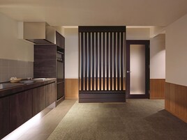 Suite with Steam Sauna (60 sqm) | Living room | 65-inch flat-screen TV with digital channels, TV