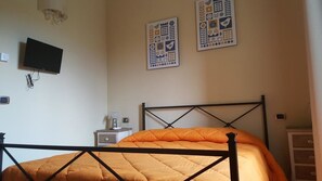 Quartos à prova de som, Wi-Fi de cortesia, roupa de cama