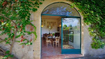 Lunch, dinner served; local cuisine, garden views