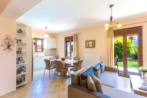 Luxury Villa (Villa Roumeli) | Living room | Flat-screen TV, fireplace, DVD player