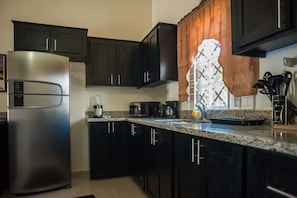 Comfort Cottage, 3 Bedrooms, Accessible, Private Pool | Private kitchen | Full-size fridge, microwave, oven, stovetop - Island Blues Cottage at Draxhall Country Club (Ocho Rios)