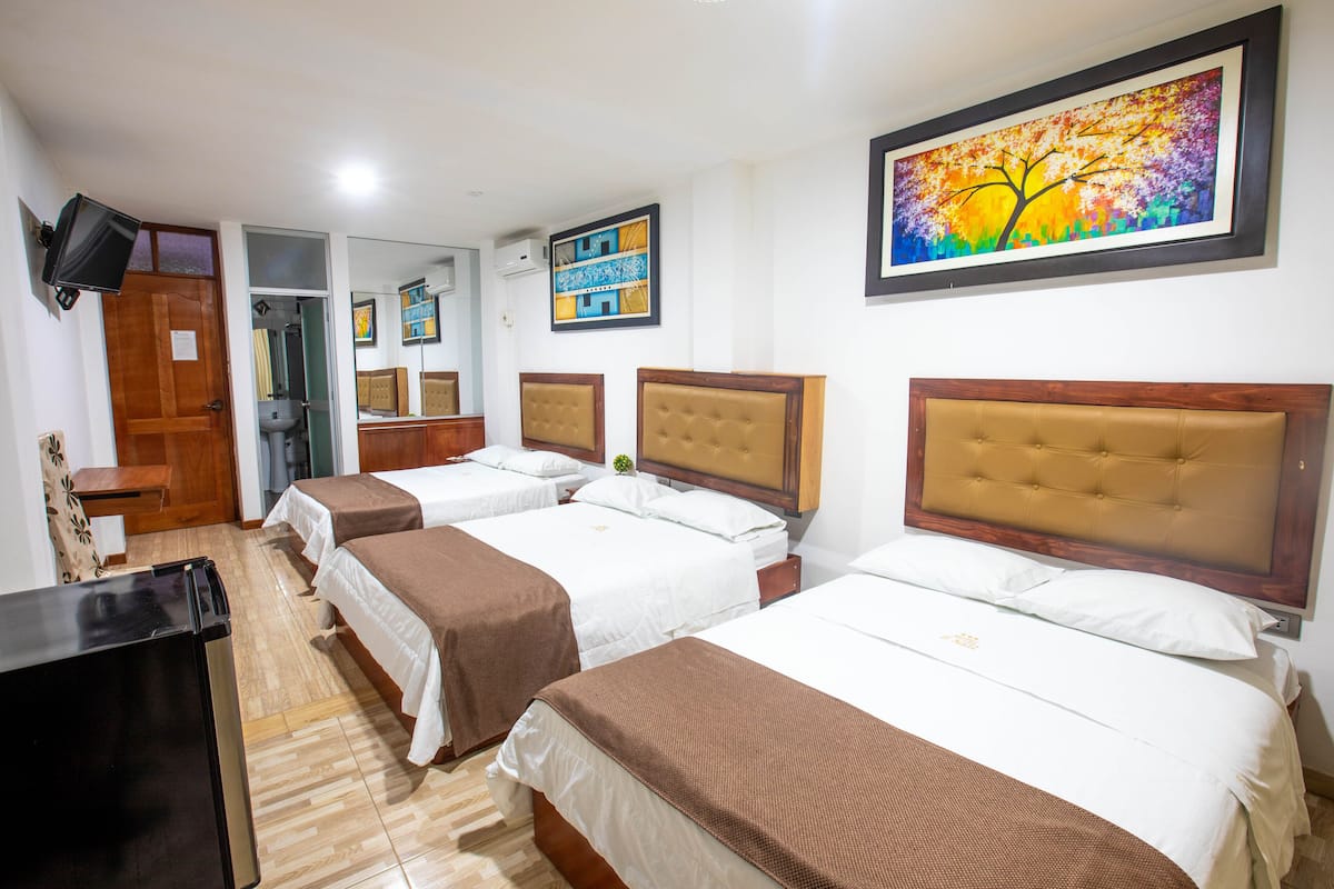 Deluxe Triple Room | Premium bedding, down duvets, in-room safe, desk
