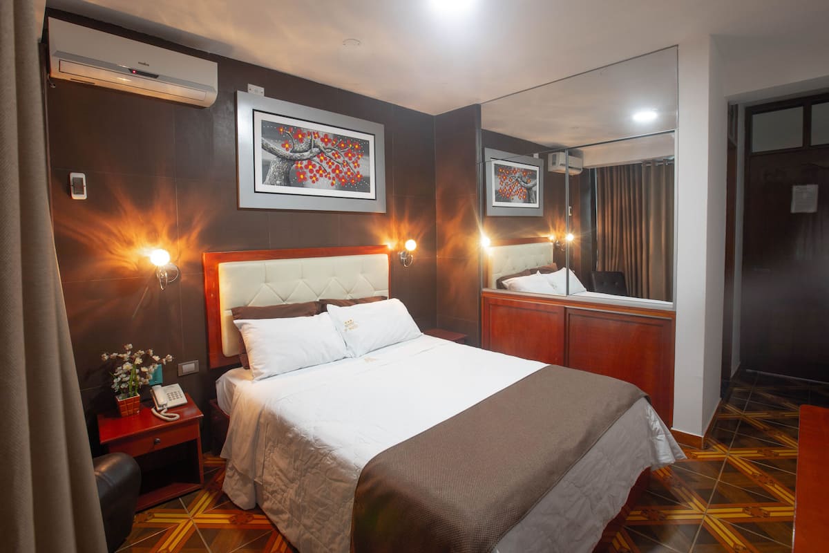 Premium bedding, down duvets, in-room safe, desk