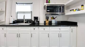 Fridge, microwave, coffee/tea maker, toaster