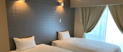 Chambre avec lits jumeaux