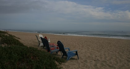 Pasos de ver puestas de sol en la arena